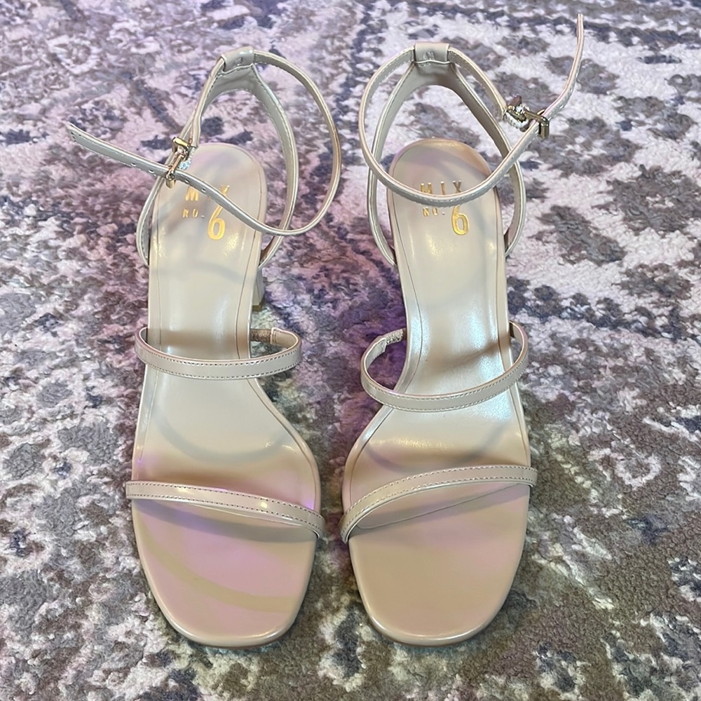 Nude strappy heel. Size 8.5. Only worn once!